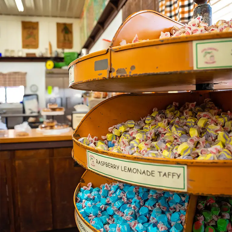 A large display of many taffy varieties in the market.